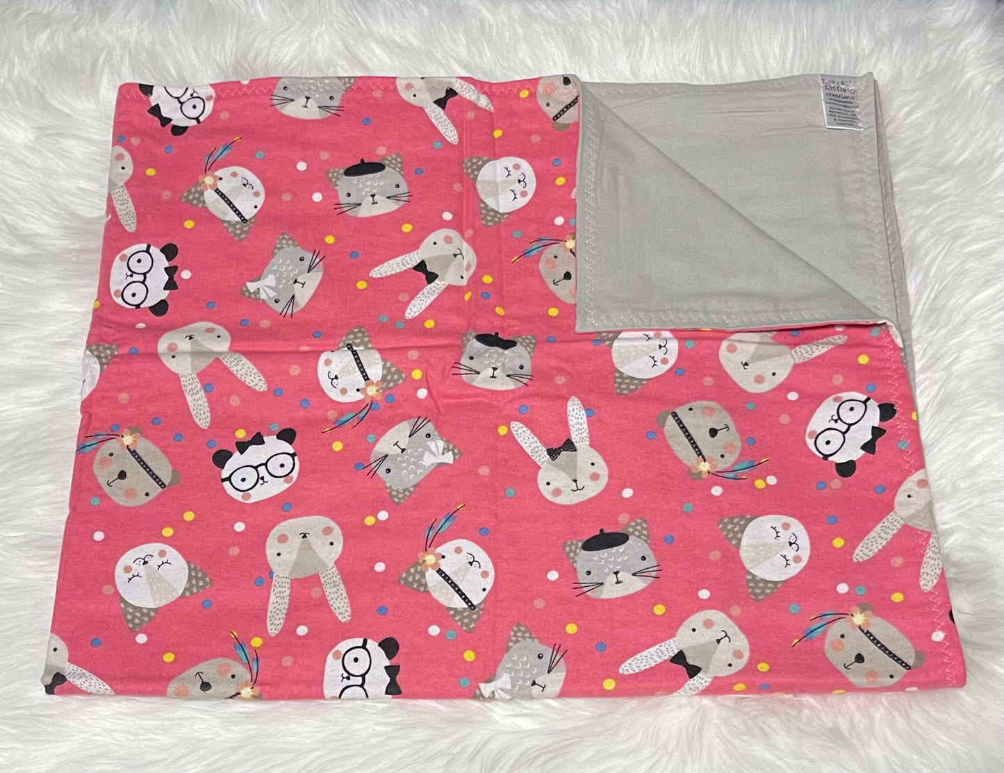 Pink and gray animal toddler blanket