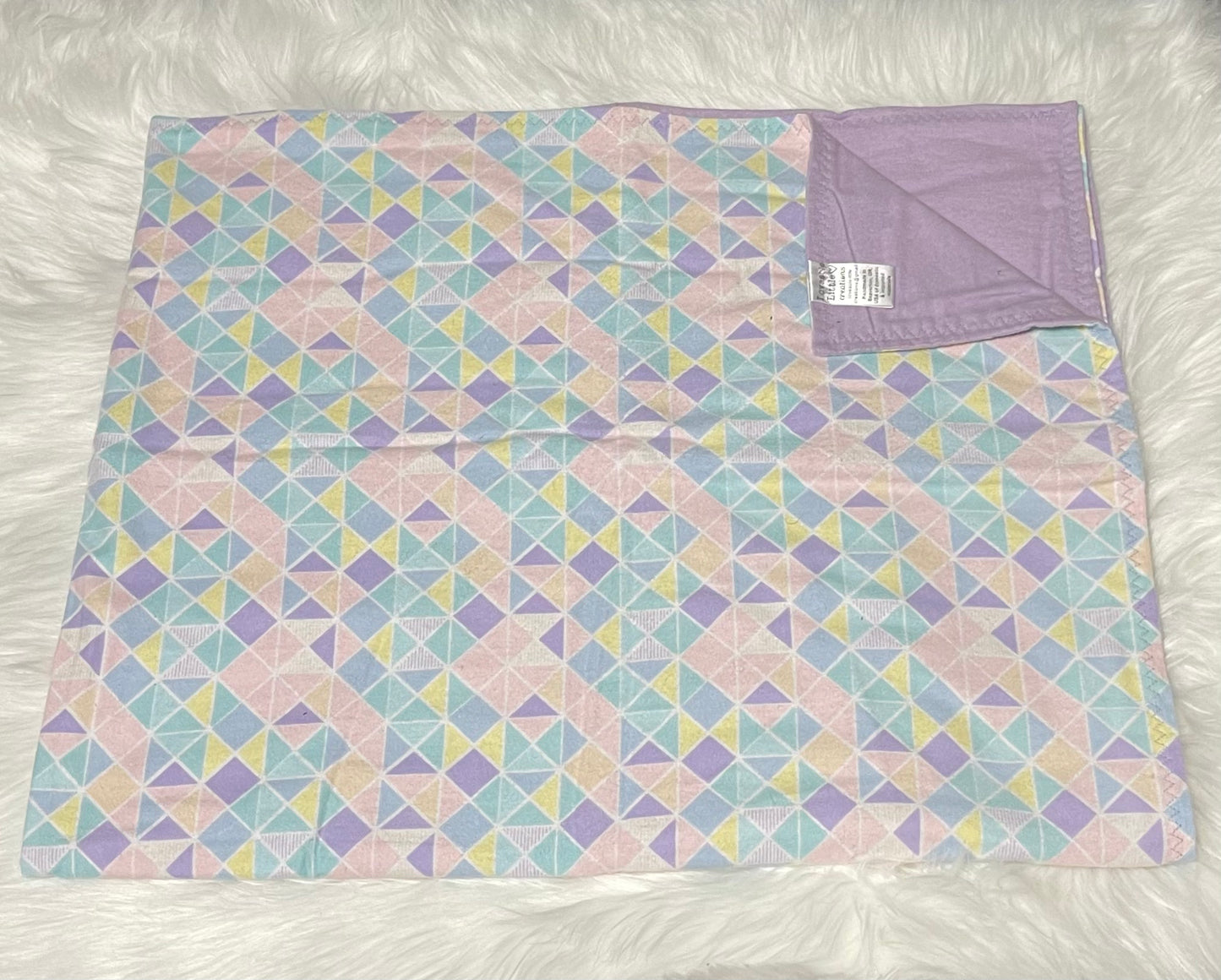 Pastel triangle toddler blanket